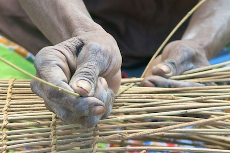 Cassie De Colling basket weaving photography in Peppimentari and Darwin Australia on Travel Chicks