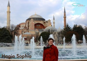 In front of a fountain in Istanbul, Turkey. The Hagia Sophia is in the background.